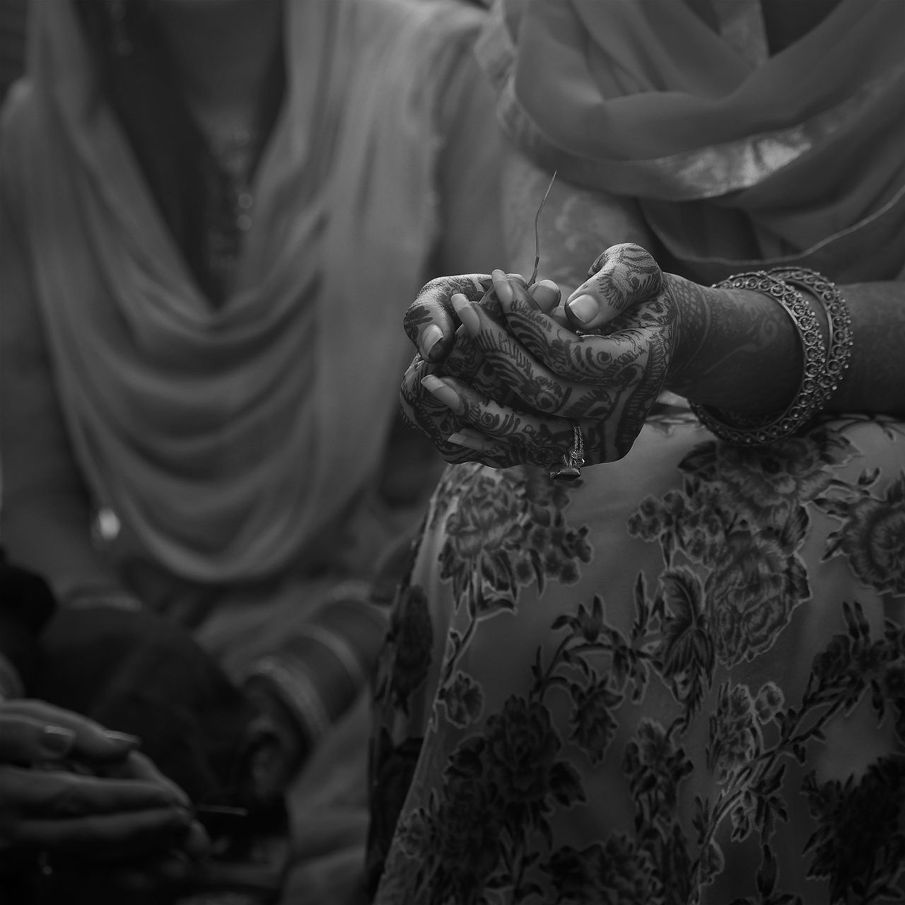 Bride and groom hands joined during a Nikah ceremony